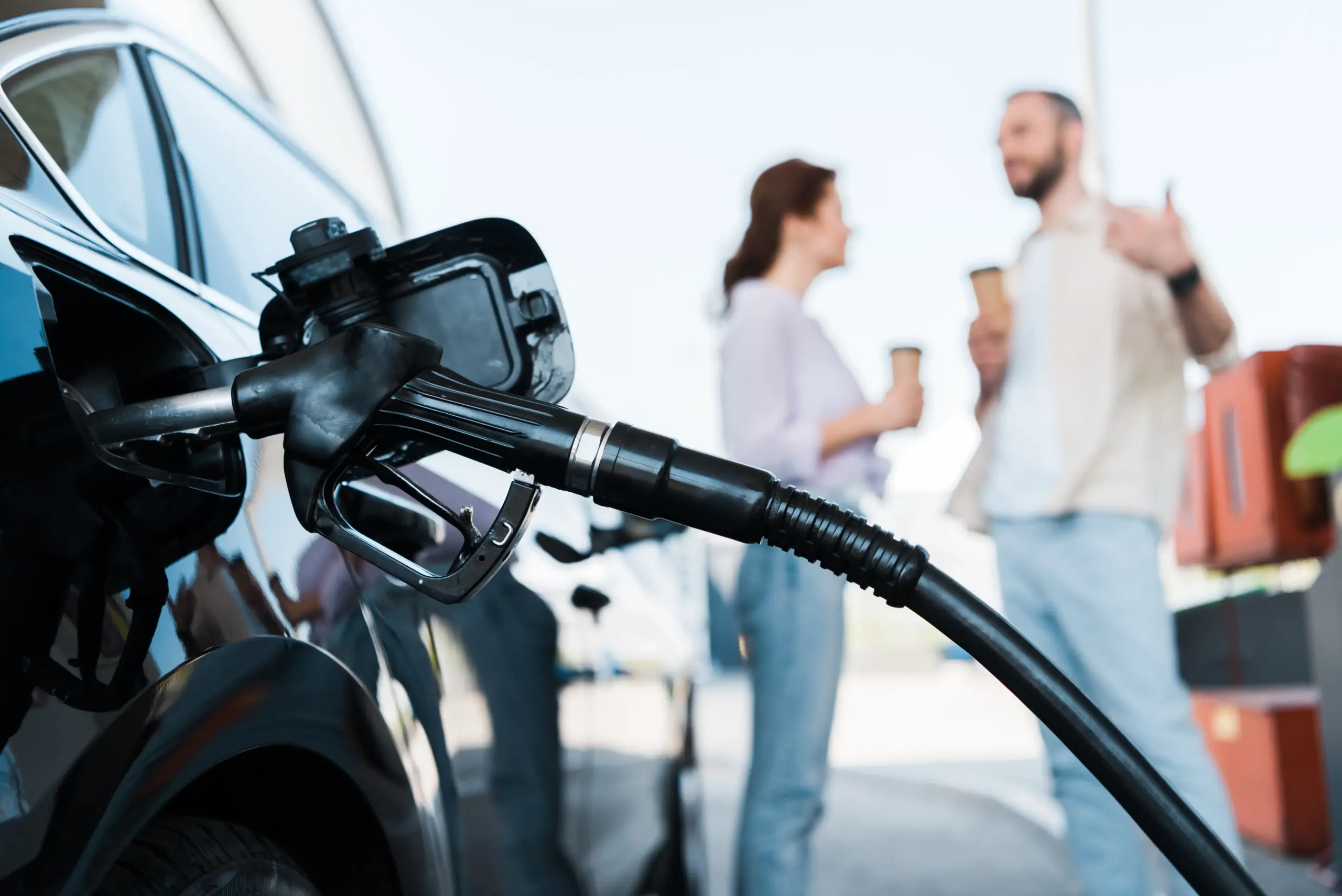 selective-focus-of-black-automobile-refueling-with-2026-01-06-00-41-08-utc